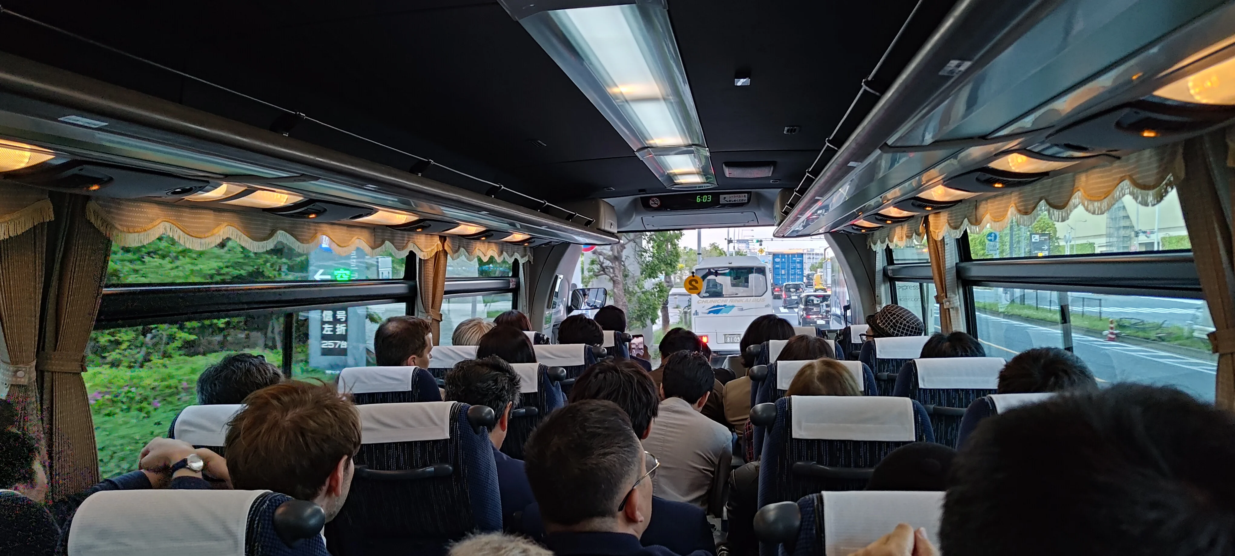 A photo of passengers sitting inside the shuttle bus heading to TiB from SusHI Tech 2026 venue
